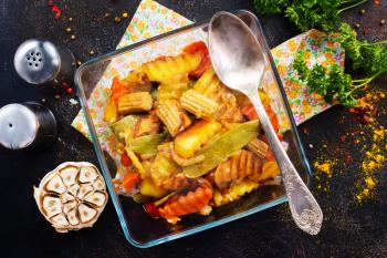 baked vegetables in glass bowl, stock photo