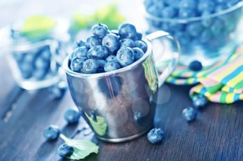 fresh blueberry on a table, blueberry on wooden background