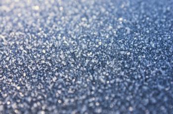 Blue hoarfrost surface macro view with shallow depth of field
