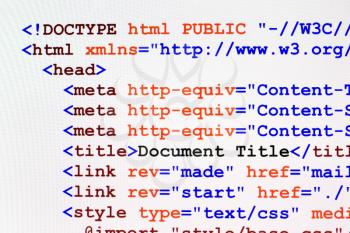 Web page HTML source code with document title, metadata description and links monitor screenshot front view