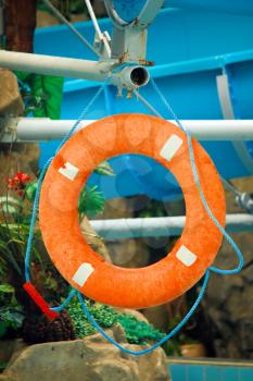 Protection and safety concept: red life buoy in the Water Park