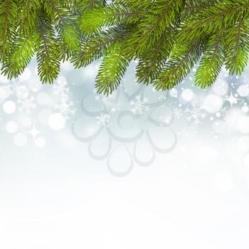Christmas background with snow and fir tree branches