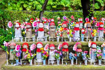 Jizo statues at the cemetery of Zojo-ji temple, Tokyo, Japan