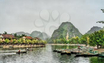 Rowboats in Tam Coc town at the Trang An Scenic Area, the Ninh Binh Province of Vietnam
