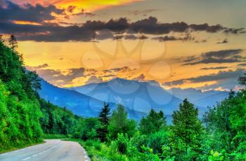 Road to French Alps at sunset in summer. Near Lalley in Isere