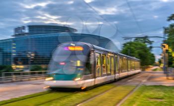 City tram passing near the European Parliament in Strasbourg - Bas-Rhin, France