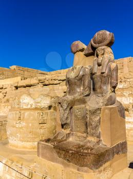 Statues of Ramses III. and Thoth at the mortuary temple - Egypt