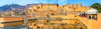 Amer and Jaigarh Forts and Kesar Kyari Garden in Maotha Lake. Jaipur - Rajasthan State of India