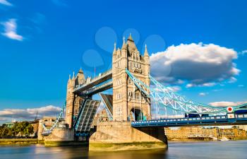 Opened Tower Bridge across the Thames River in London, England