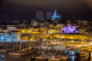 Notre-Dame de la Garde over the Old Port in Marseille