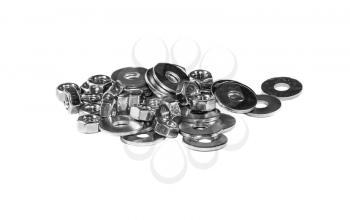 A handful of mounting washers and nuts isolated on a white background