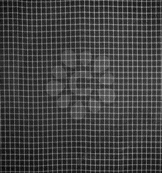 Black white fabric texture in a cage