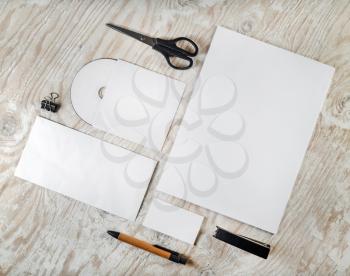 Blank stationery template on light wooden background. Mock-up for branding identity. Photo.