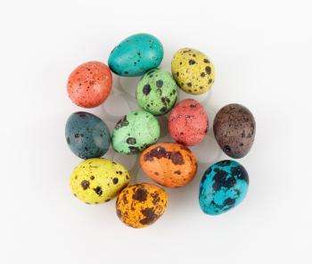 Painted Easter eggs on a light background. Top view.