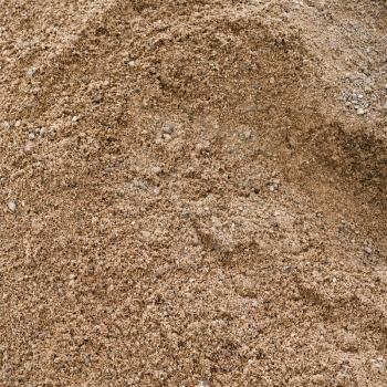 Close-up of sand texture. Coarse sand grains background.