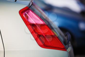 Closeup of a taillight on a modern car. Shallow depth of field. Selective focus.