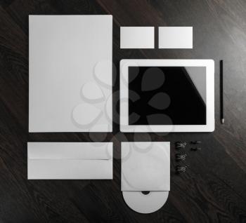 Corporate identity template on wooden background. Top view.