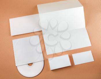 Photo of blank stationery set on bright color background. Template for branding identity. Top view.