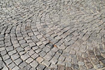 Abstract structured background. Stone paving texture. Vintage old cobblestone pavement.