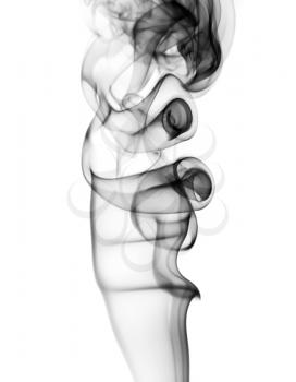 Photo of abstract smoke swirl on white background. Vertical shot.