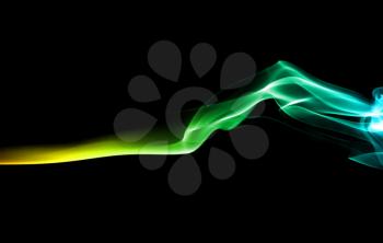 Abstract bright colored green smoke on a dark background.