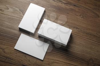 Photo of blank business cards on wooden background. Template for ID. Top view.