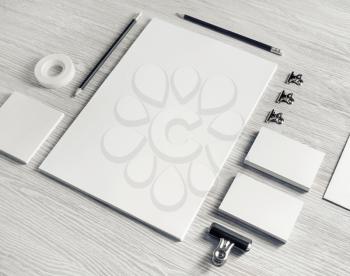 Blank white stationery set. Business brand template on light wood table background. Branding mock up.