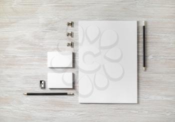 Blank business stationery mock-up on light wooden background. Corporate identity template. Branding mock up. Flat lay.