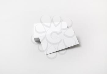 Photo of blank business cards on paper background. For design presentations and portfolios.
