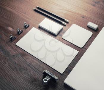 Photo of blank stationery set. Corporate identity template on wooden background.
