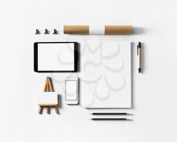 Corporate stationery set. Blank branding identity template on paper background. Top view.