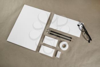 Blank stationery set on craft paper background. Corporate identity template. ID mockup. Mock up for branding identity. Responsive design mockup.