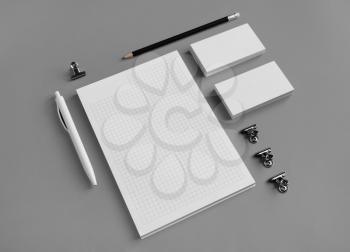 Photo of blank stationery set on gray paper background. Business brand template. Branding mock up.
