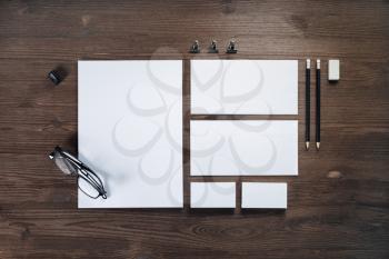Blank stationery set on wooden background. ID template. Mockup for branding identity for designers. Flat lay.