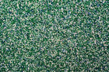 Horizontal vivid green blue pebble grainy sand textured abstract background backdrop