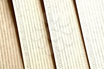 Diagonal vintage yellow punched card textured background