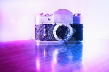 Vntage pink and purple rangefinder camera background hd