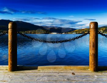 Horizontal vivid Norway fjord ocean landscape pier composition background backdrop