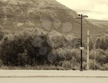 Oppdal street lamp and train communications sepia background hd