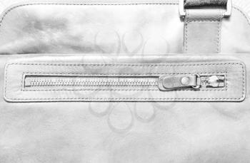 Horizontal bleached pale leather case with zipper background