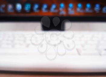 Desktop icons on monitor with keyboard bokeh background hd