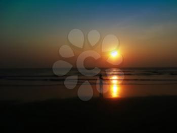 Horizontal child shadow meeting sunset on the beach bokeh background