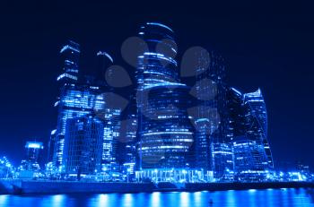Futuristic Moscow city skyscrapers at night background