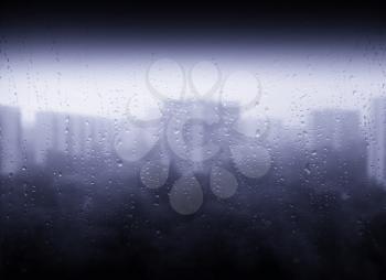 Raindrops on window city texture background