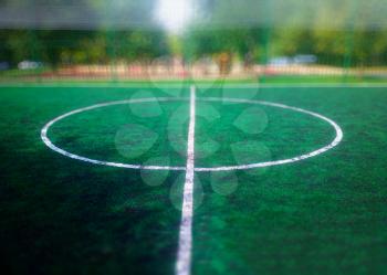 Green small football field background