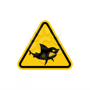 Sign of attention to  sharks. Yellow warning sign for Ocean. Swimming is prohibited in  waters inhabited by predators
