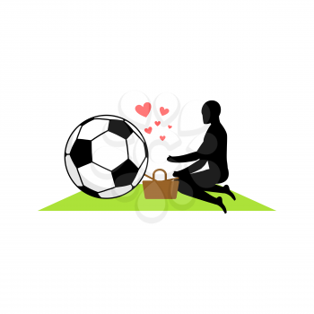 Lover Soccer. Guy and football ball on picnic. Meal in nature. blanket  and basket for food on lawn. Romantic date. Love sport play game 
