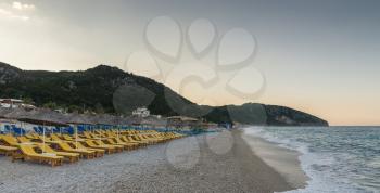 Beautiful summer morning on a sandy beach in Dhermi, Albania