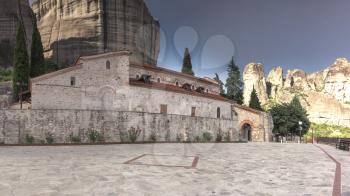 Panoramic view of the Assumption of Virgin Mary byzantine church in Meteora, Kalambaka town in Greece, on a sunny summer day