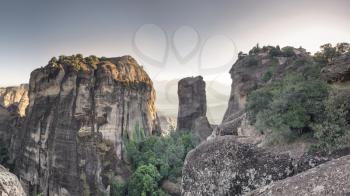 Panoramic view of the Great Meteoron Monastery in Meteora, Kalambaka town in Greece, on a summer evening